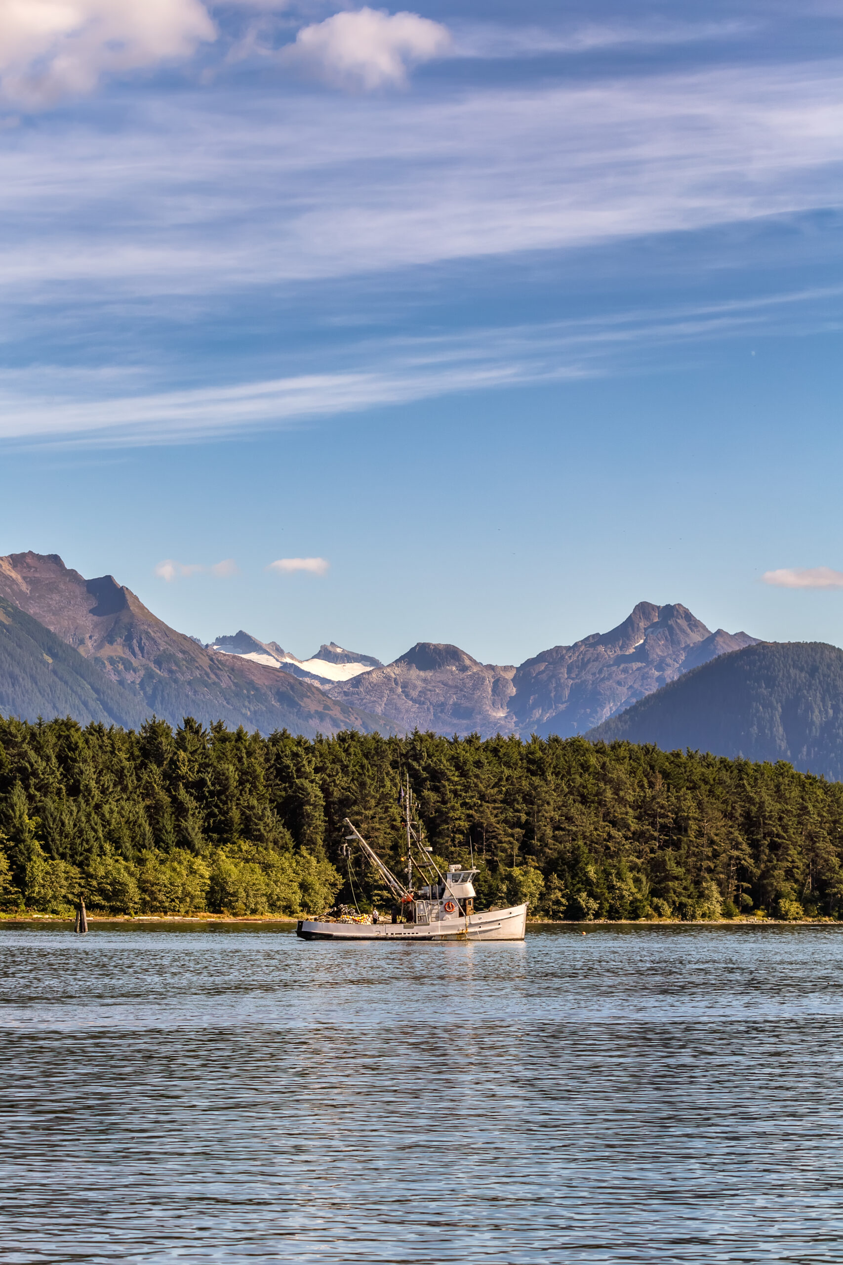Fishing boat anchored in an Alaskan harbor